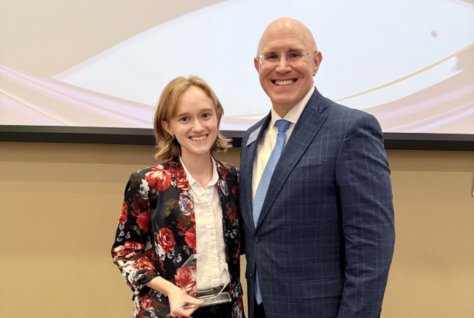 Justine Grace with Roach Honors Dean Ronald Pitcock